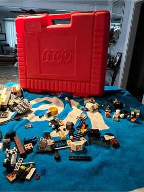 Lego Red Carrying Case with Multicolor Bricks and Minifigure Parts